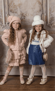 Girl wearing Julie pink cotton set with matching pink beret with pink pom pom detail