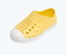 Angled view of a Native Shoes Kids Jefferson Kids | Gone Bananas Yellow/ Shell White Footwear