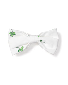 The Dog Twill Bow Tie in Shamrocks by Petite Plume features small green shamrocks on a crisp white background, perfect for adding holiday flair to your pets wardrobe.