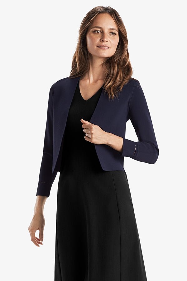 front image of a woman wearing the sant ambroeus jardigan in navy | Exclude