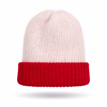 Knitted beanie with white top and red band on a white background