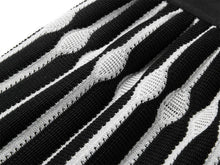 Hollowed-out Embossed Texture Skirt | Black