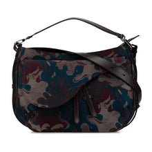 Dior | Pre-Owned Peter Doig Denim Camouflage Soft Saddle Bag | Brown
