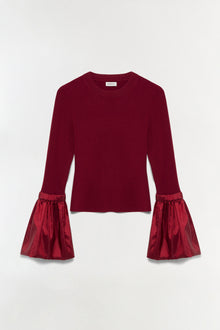 Burgundy ribbed knit top with gathered taffeta bell sleeves and crew neckline.