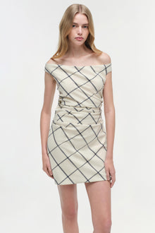 Cream mini dress with gray diagonal grid pattern, off-shoulder neckline, and ruched waist detailing.