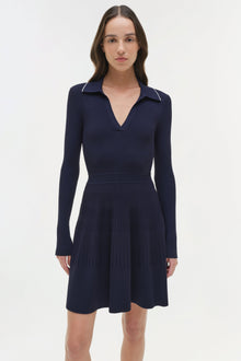 Navy ribbed knit mini dress with collared V-neckline and long sleeves on model.