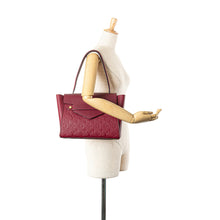 Louis Vuitton | Pre-Owned Monogram Empreinte Trocadero | Red/Bordeau