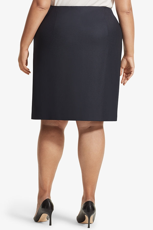 Back image of a woman standing wearing the Logan skirt sharkskin in Ink | Plus Hover | Exclude