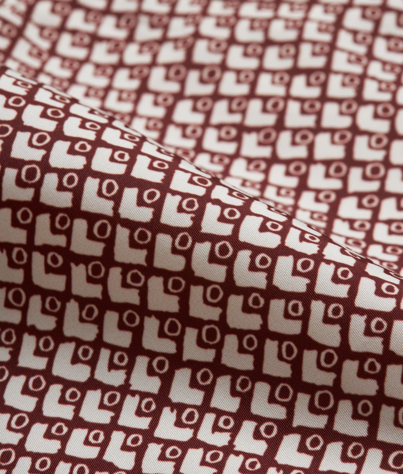 Bulldog Geo Print Mid-Length Swim Shorts | Copper Red/White Sand