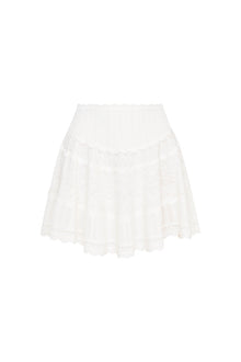 Knitted mini skirt featuring a ribbed yoke, elasticated waistband and a flouncy skirt.