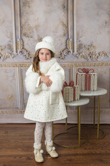 ivory marshmallow wool coat. perfect for the winter season detailed with fur and gems all around the coat 
