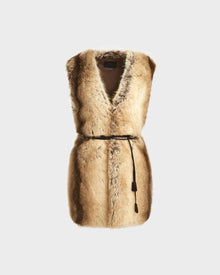 The YOLANDA - 8124790 Mocha by Rudsak is a women’s faux fur vest with a chic vegan leather belt—ideal for upgrading your fall and winter style.