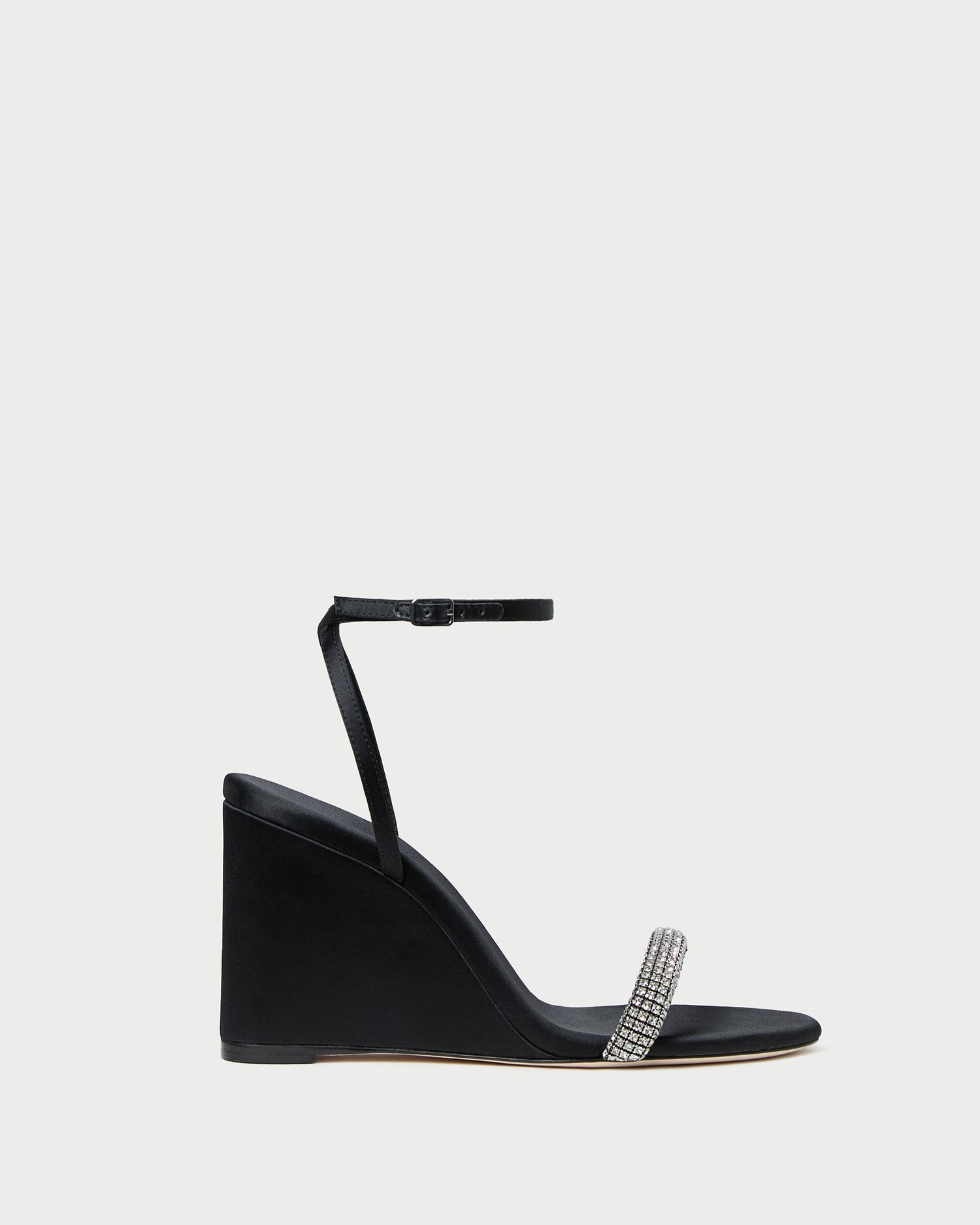 Gavi Black/Diamond Satin Wedge in black satin with crystal accents.