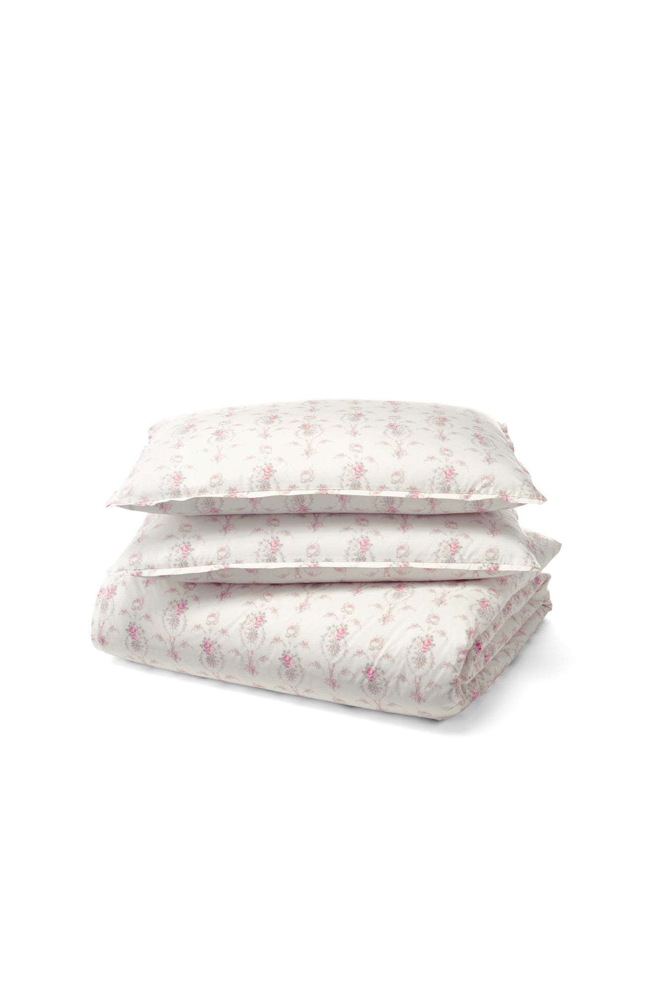 This dreamy ensemble features a delicate pink floral pattern on a pristine white backdrop. Crafted from 100% cotton