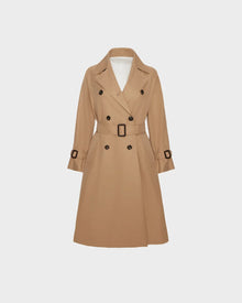 The MIRELLE - 8124055 Khaki by Rudsak is a beige womens trench coat with a tailored silhouette, double-breasted front, wide lapels, matching belt, and black button and buckle details, shown on a plain white background.