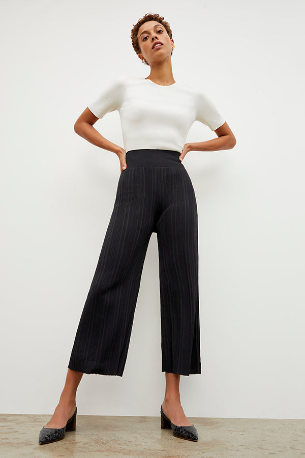 Front image of a woman wearing the Marijane Pant - Textured Knit in Black | Exclude