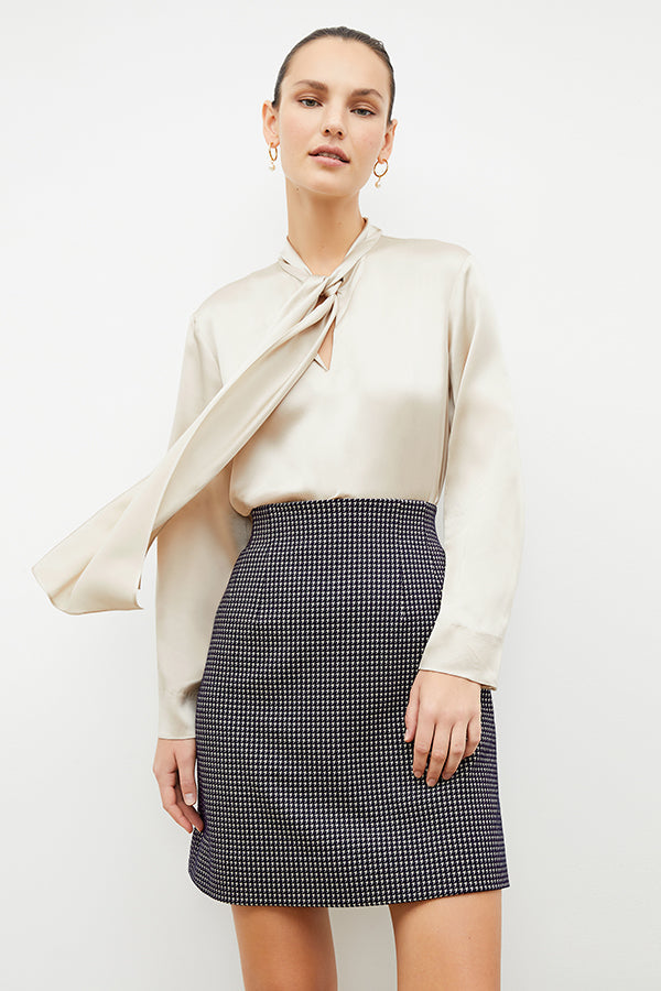 Front image of a woman wearing the whitney skirt in black and white | Exclude | Grid | Still
