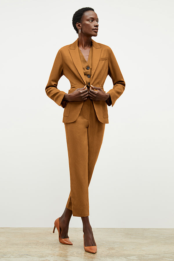 Front image of a woman wearing the Shane Pant in Acorn | Exclude 