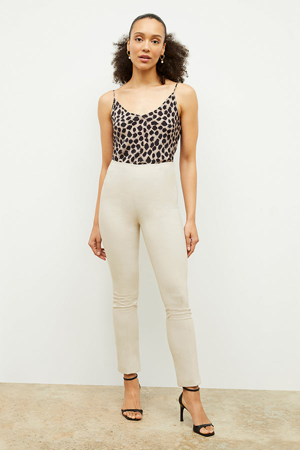 Front image of a woman standing wearing the foster pant in bone | Exclude