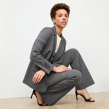 front image of a woman wearing the yiyan jacket in stretch houndstooth