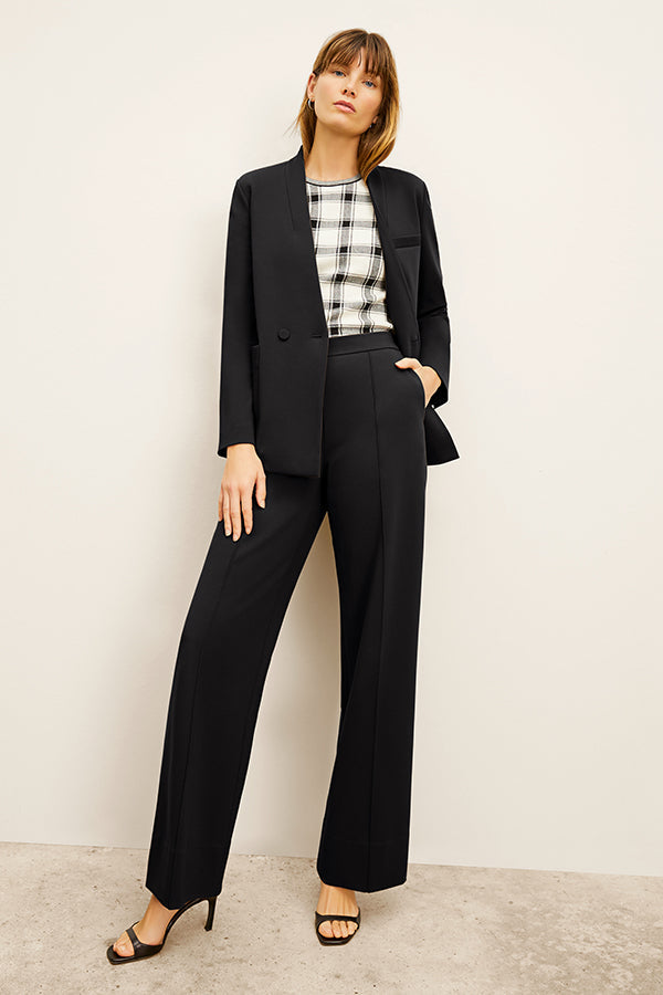 front image of a woman wearing the janette blazer in black | Exclude 