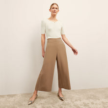 front image of a woman wearing the charlie top in ivory 