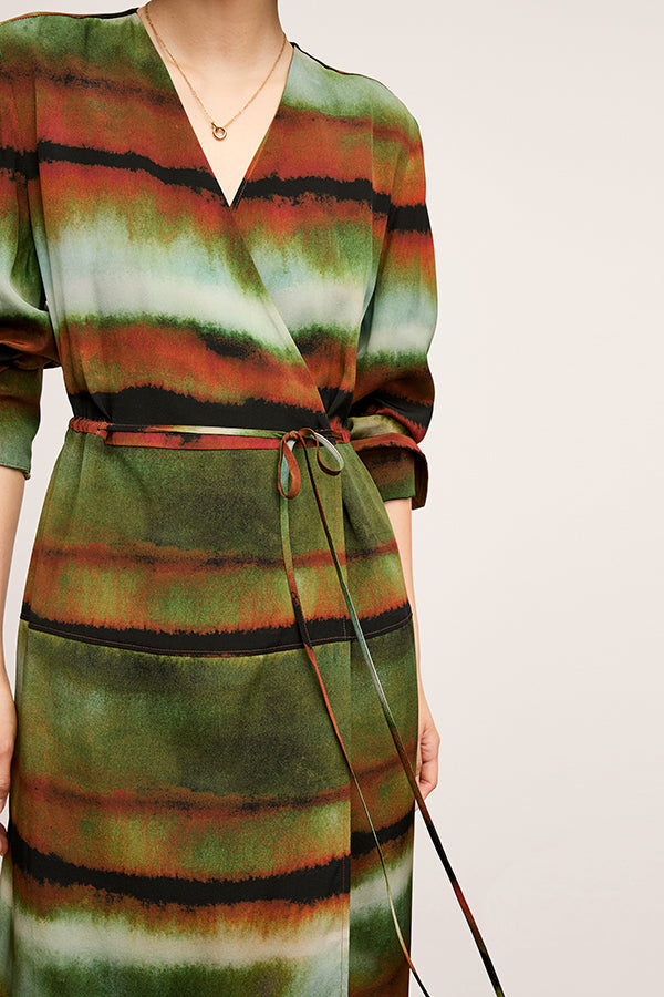 Front image of a woman wearing the Deana dress in Faded Print | Exclude