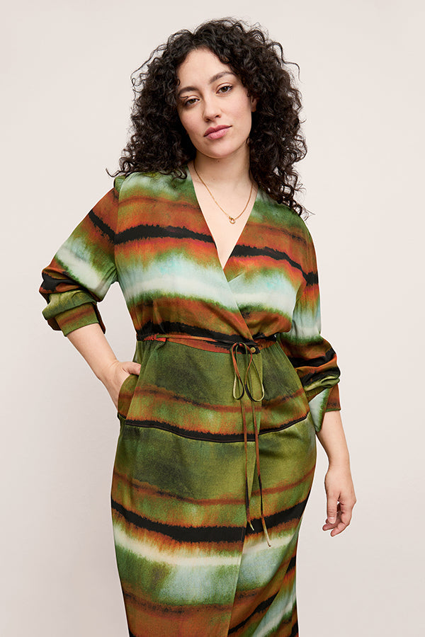 Front image of a woman wearing the Deana dress in Faded Print | Exclude | Grid Hover