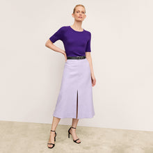 front image of a woman wearing the eva skirt in lilac/ivory