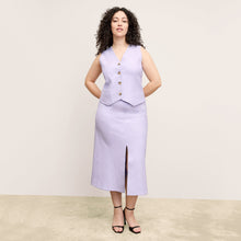 front image of a woman wearing the eva skirt in lilac/ivory 