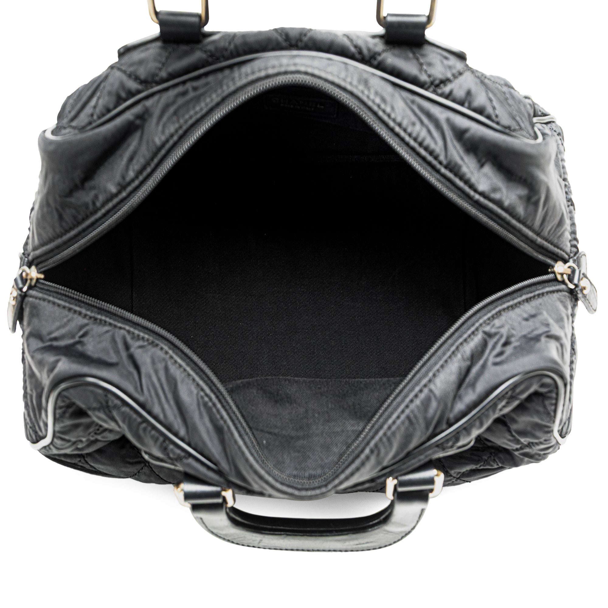 Chanel | Pre-Owned Paris New York Quilted Nylon Duffle Handbag | Black