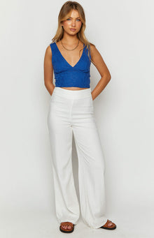 Close-up of the royal blue floral lace crop top with a deep V-neckline and wide shoulder straps