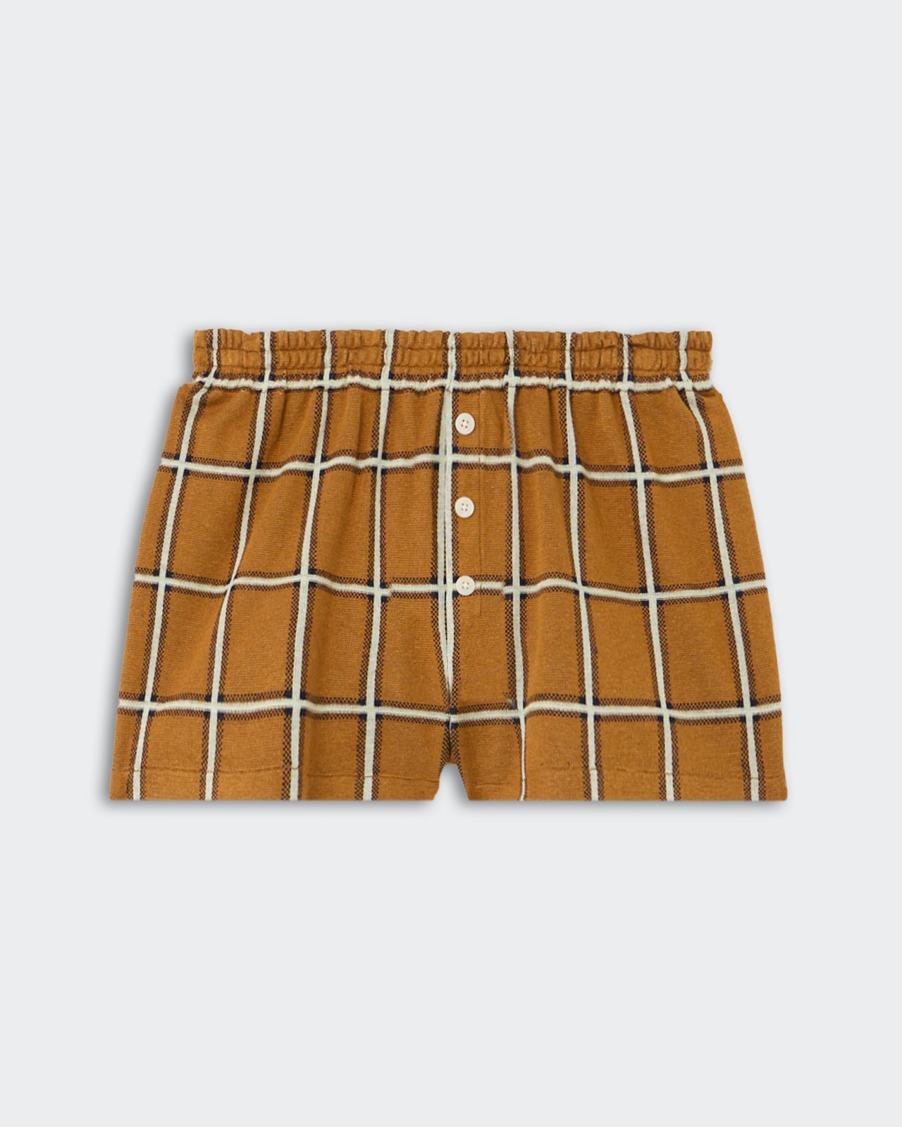 Picnic Plaid Short - Suede Combo, relaxed-fit knit shorts in warm suede brown with a bold white and black windowpane plaid pattern, featuring an elastic waistband and button fly, displayed flat.