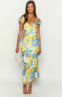 Blue and yellow floral chiffon maxi dress with a fitted bodice, sweetheart neckline, and flutter sleeves