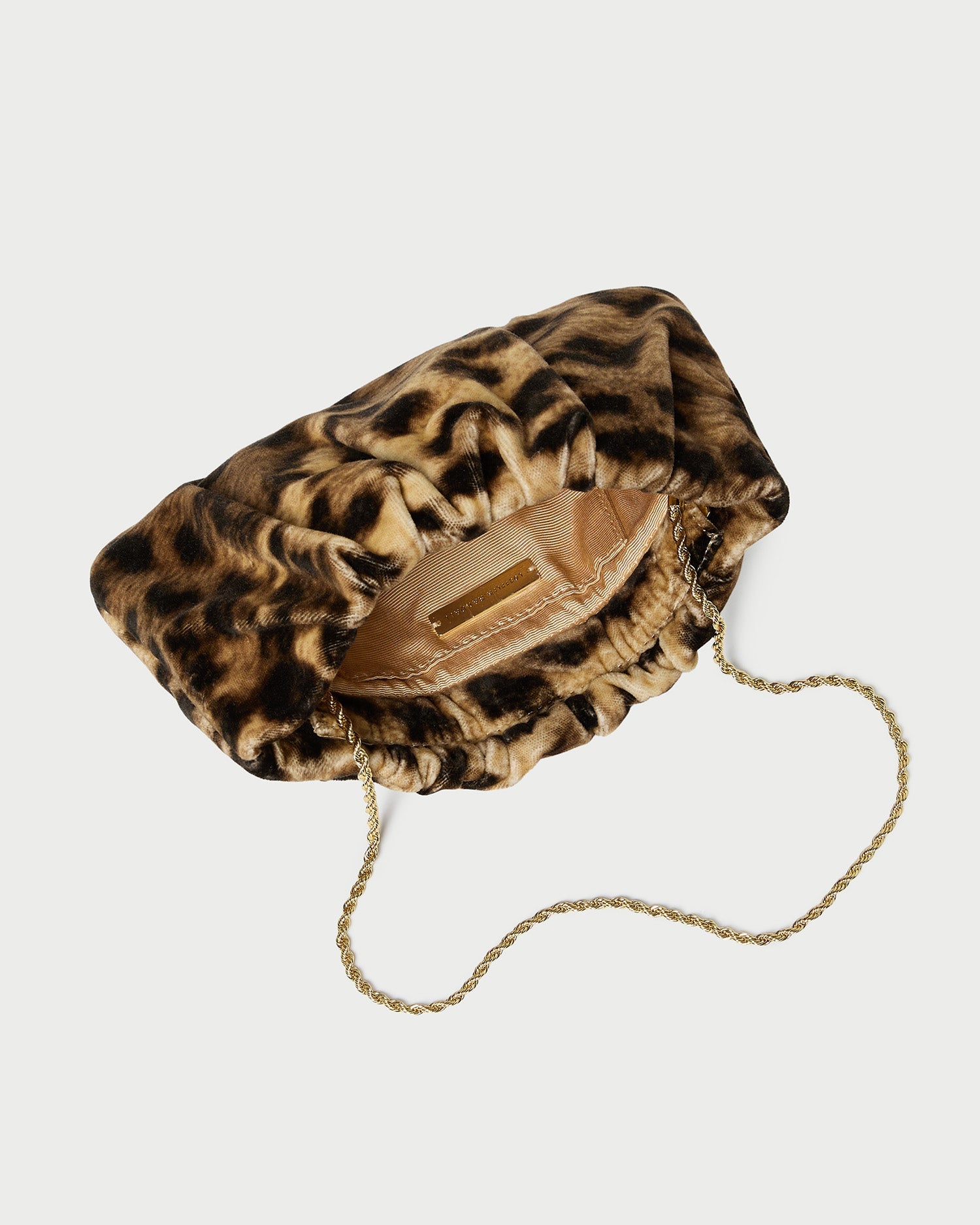 Serena Leopard Gathered Velvet Clutch in leopard print velvet.