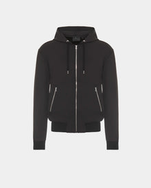 The RUDSAK ROGER - U523507 Black M is a unisex zip-up hoodie with two front zippered pockets and hood drawstrings, ideal for urban style. Shown on a plain white background.