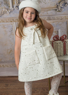 marshmallow wool dress with bow detail along with glitter and two front pocket squares. perfect for this winter season 