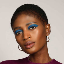 14k recycled gold Full Pave Ripple Stud Earring. Styled on a ear with ripple demi pave hoops