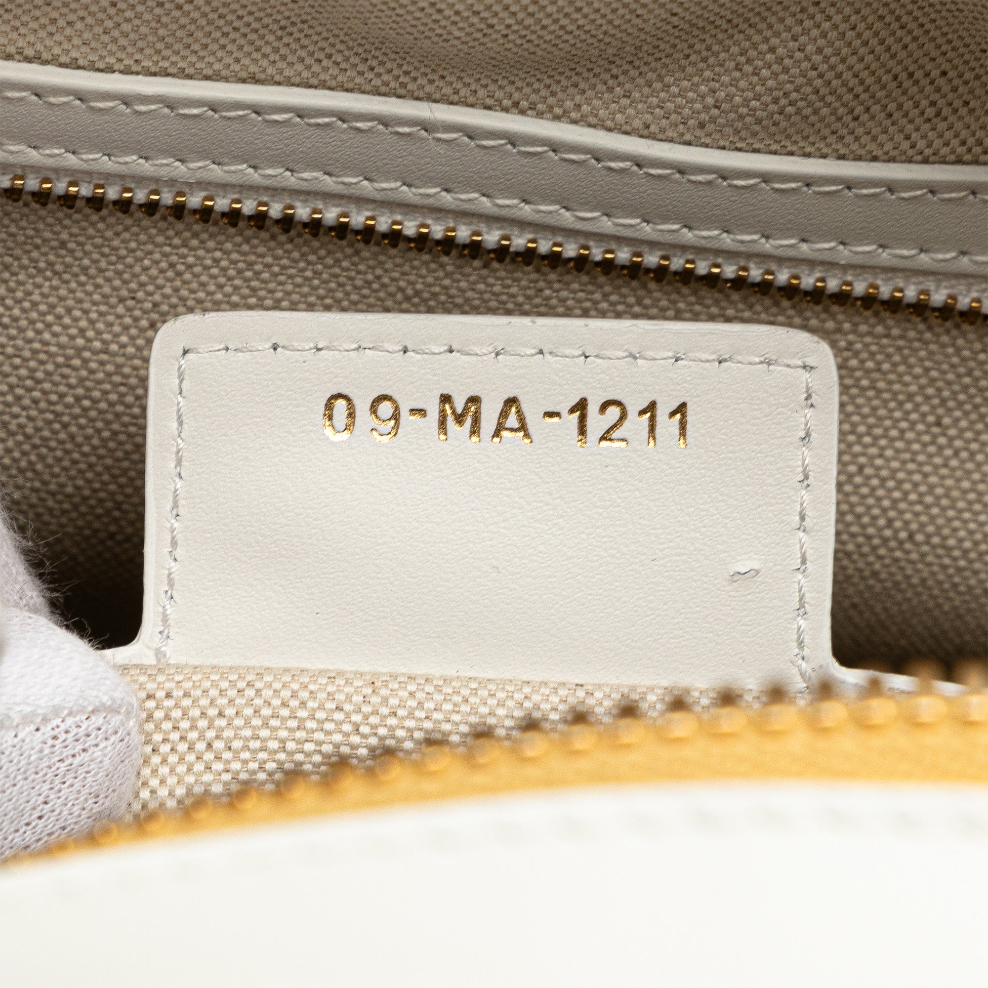 Dior | Pre-Owned Medium Padded Etoile Leather Vibe Zip Bowling Bag | Gold