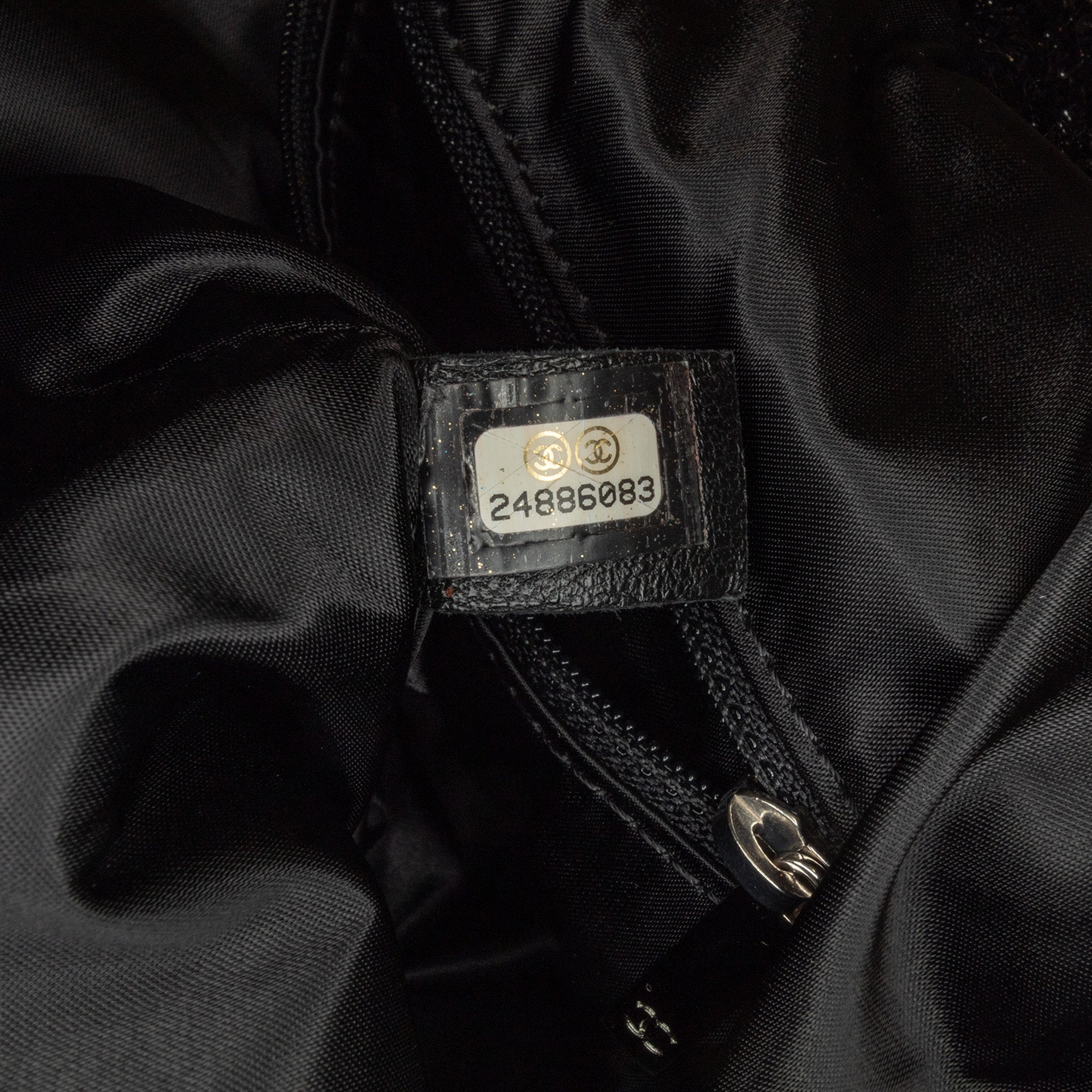 Chanel | Pre-Owned Large Quilted Knit Pluto Glitter Satchel | Black