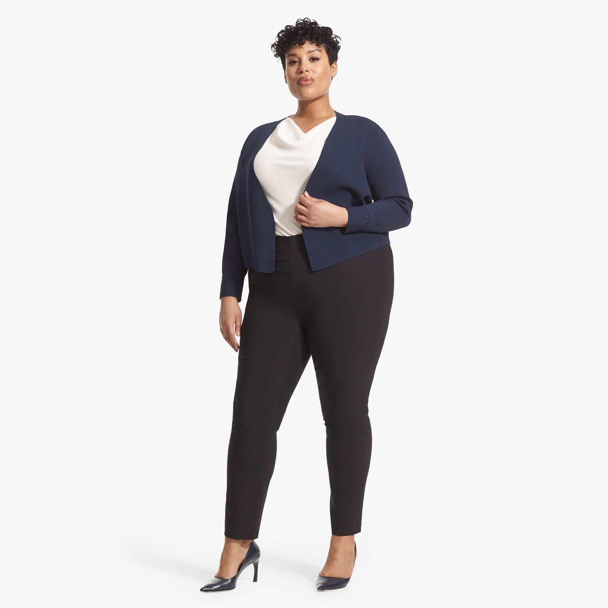 front image of a woman wearing the sant ambroeus jardigan in navy | Exclude