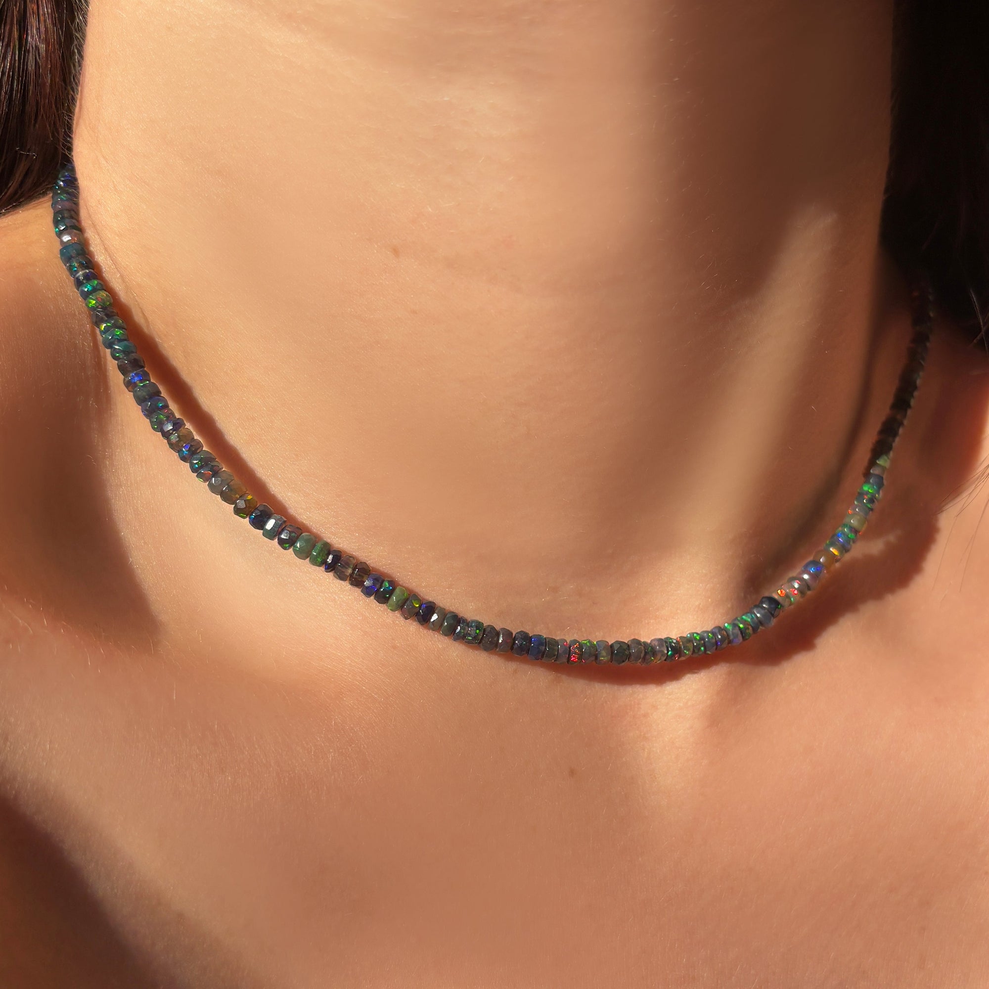 Small Black Faceted Opal Necklace layered alone styled on a neck