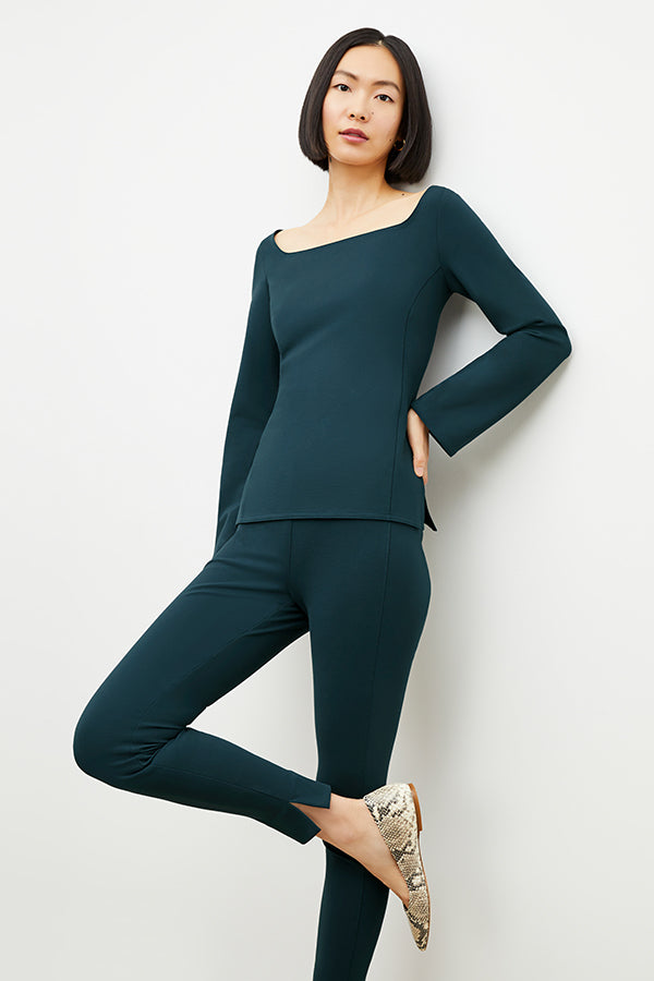 Front image of a woman wearing the Stella Legging in Deep Sea | Exclude