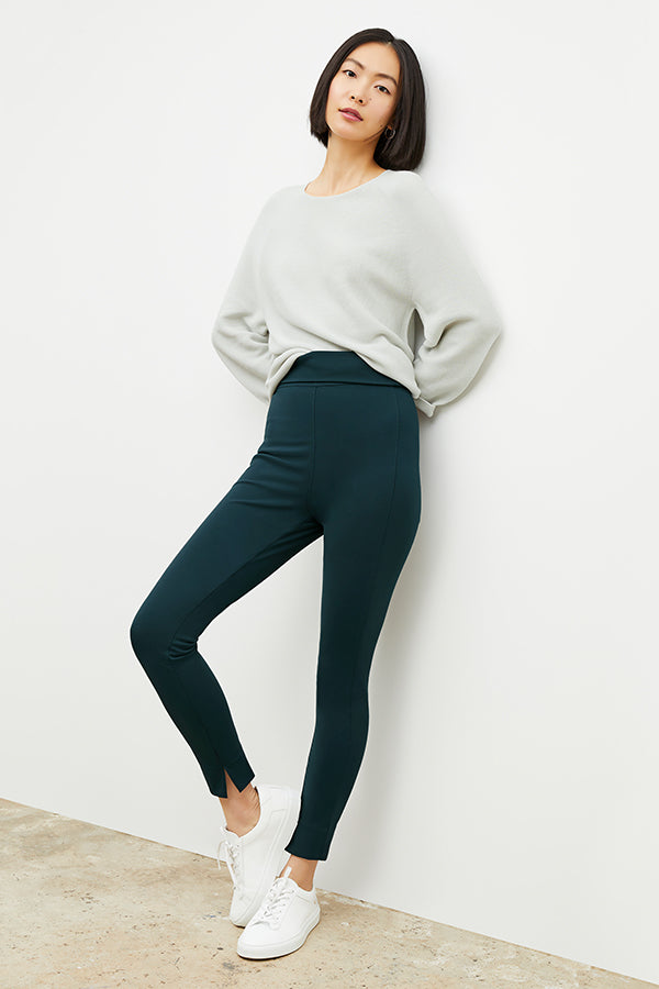 Front image of a woman wearing the Stella Legging in Deep Sea | Grid | Exclude
