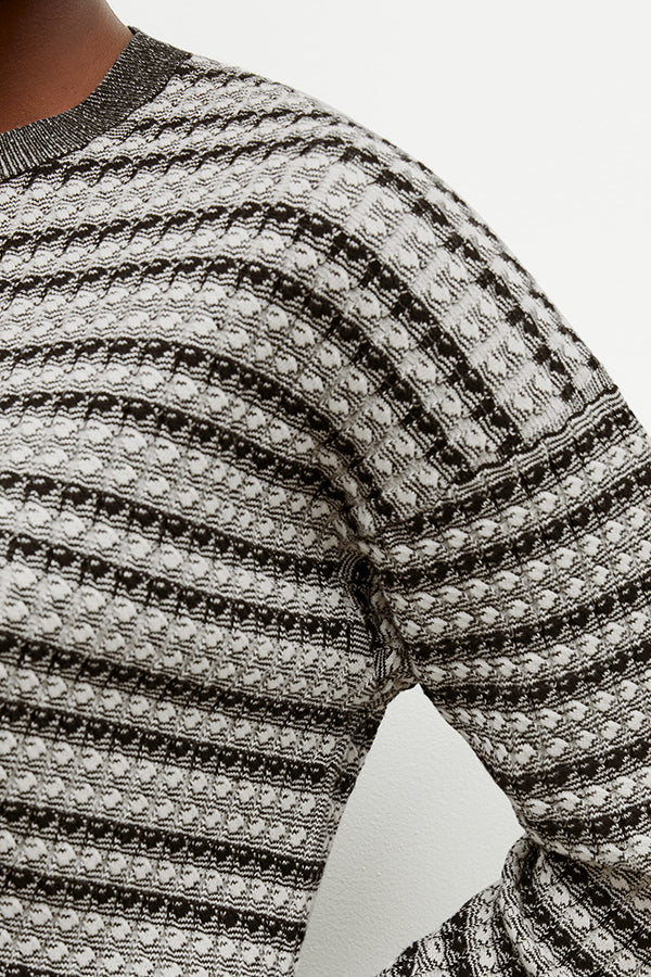 Front image of a woman wearing the tyler sweatshirt in black and white | Exclude | Grid Hover